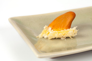 Durian seed on plate ,white background