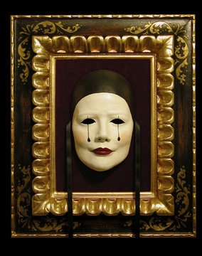 mask Pierette in golden frame