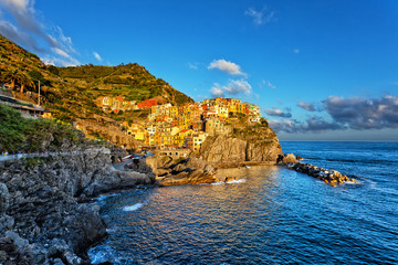 Picturesque view of Manarola, Laguria, Italy on a sunset