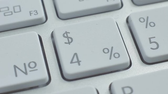 Macro video of keyboard number buttons and pressing.