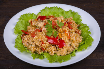 Rice with vegetables and chicken in a curry sauce.