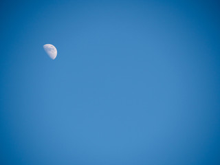 Moon on a blue sky