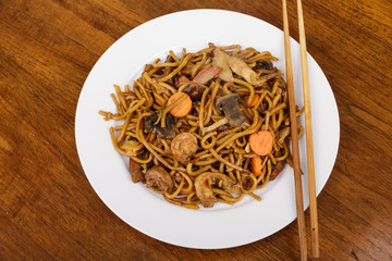 Lo Mein on White Plate with Chopsticks