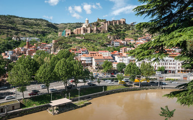 Tbilisi, the capital and the largest city of Georgia. View on old town, Kura River and Narikala...