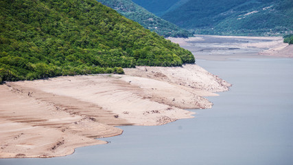 Dry banks of the Zhinvali Reservoir in Georgia, drought season.