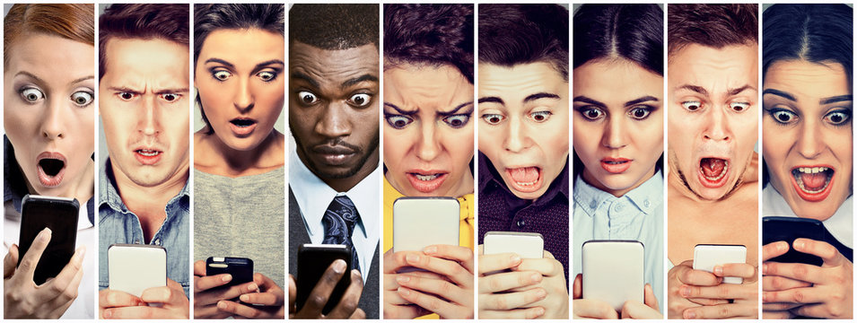 Group of people men and women looking shocked at mobile phone