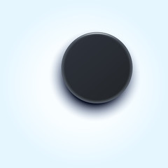 puck lying on bright background