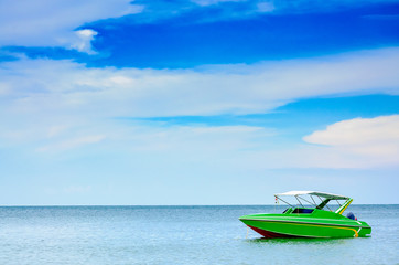 Naklejka na ściany i meble Boat, speed boat on the sea with sky natural beauty.