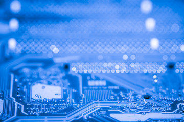 Abstract close up of Electronic Circuits in Technology on Mainboard computer background 
(logic board,cpu motherboard,Main board,system board,mobo)
