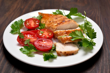Fototapeta na wymiar Sliced roasted chicken breast