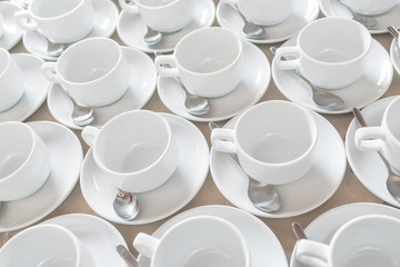 Group of empty coffee cups of white cup for service tea or coffee in breakfast or buffet and seminar event of catering and cocktail.