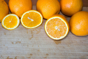 Sliced orange on a wooden board