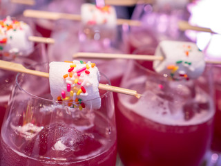 Closeup white marshmallow on stick on glass 4