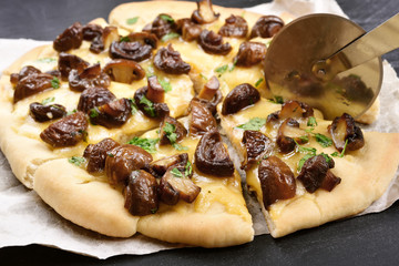 Homemade pizza with mushrooms