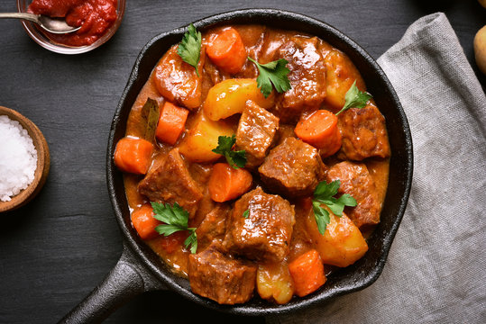 Goulash, beef stew in cast iron pan