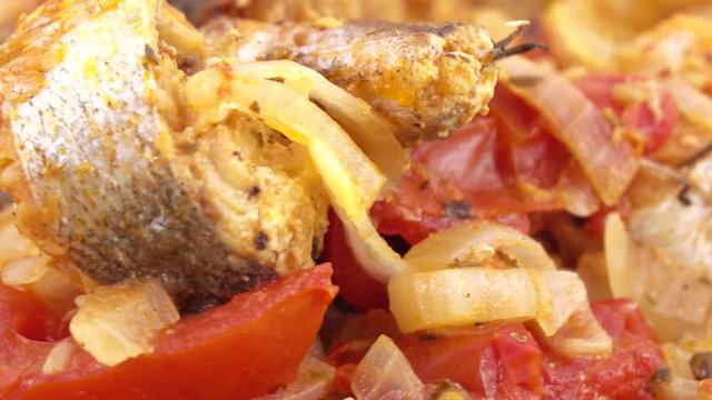 Fried pollock with onions