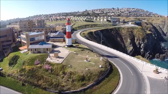 Aerial view of a lighthouse at a hill in Chile