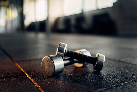 Dumbbells On Rubber Floor Closeup, Fitness Club