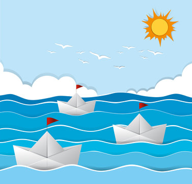 Origami boats sailing in the sea
