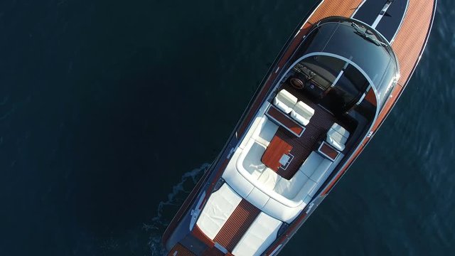Perpendicular aerial view of luxury boat anchored.