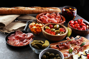 spanish tapas and sangria on wooden table - mediterran antipasti