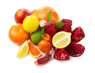 Composition of pomegranate and citrus fruits on white background