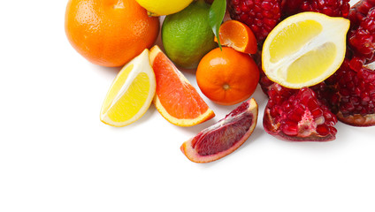 Composition of pomegranate and citrus fruits on white background