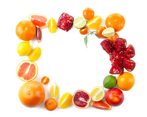Composition of pomegranate and citrus fruits on white background