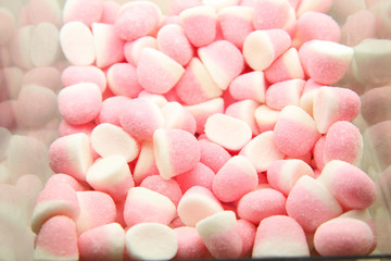 Plastic box with jelly sweets in candy shop