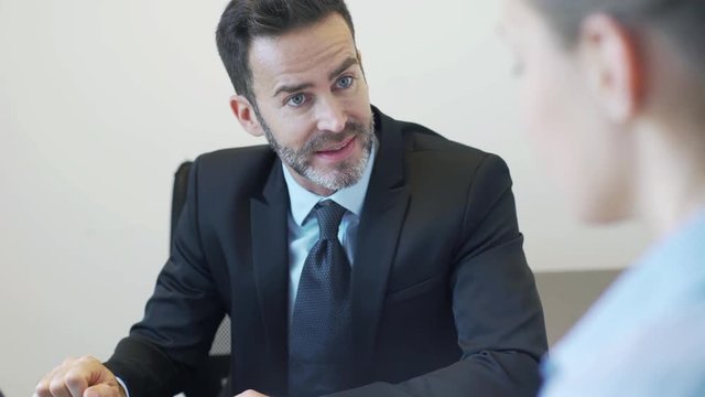 Real estate agent meeting with client