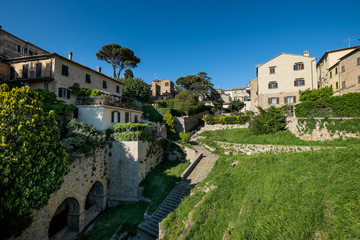 VOLTERRA, TUSCANY - MAY 21, 2017 - The door and the source of San Felice