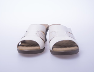 shoe. woman sandal on background. woman sandal on a background.