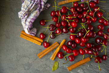 Sweet cherries on rustic wooden background