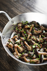 fried shiitake mushrooms in garlic herb and olive oil snack