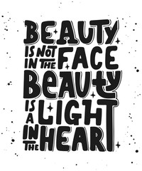 Naklejka premium Beauty is not in the face, beauty is a light in the heart. Modern brush calligraphy.