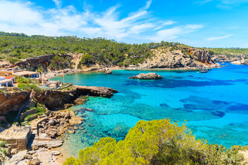 Stunning view of Cala Xarraca beach with azure sea water on northern coast of Ibiza island, Spain