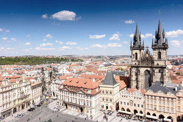 Fototapeta premium Old town of Prague with beautiful houses with tiles and an old castle