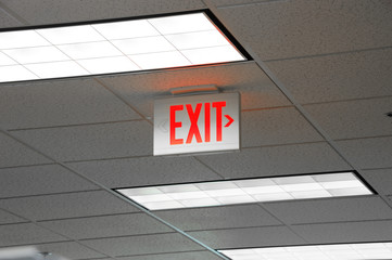 red exit sign and light on the ceiling - Powered by Adobe