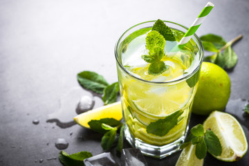 Mojito cocktail in glass. Traditional summer cold drink.