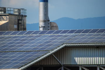 solar panels on top of industrial roof object