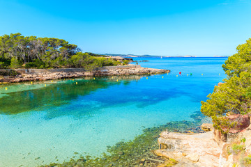 View of beautiful Cala Gracio bay with azure sea water at early morning, Ibiza island, Spain