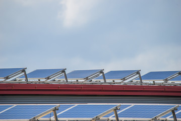 Fototapeta premium solar panels on top of industrial roof object
