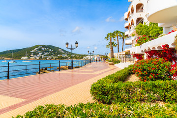 Naklejka premium Coastal walkway along sea in Santa Eularia town on Ibiza island, Spain