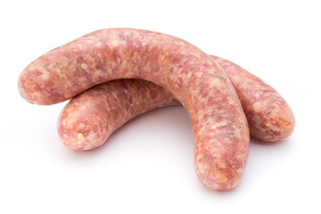 Raw sausage with parsley leaf isolated on white background.