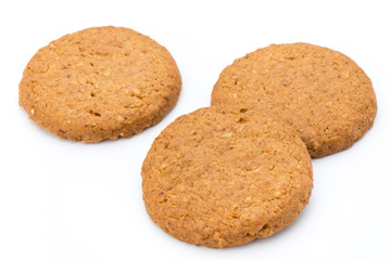 Stacked short pastry cookies isolated on white background.