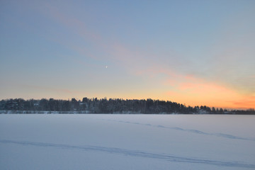 Winter landscape at sunset.