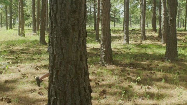 Boy running in woods