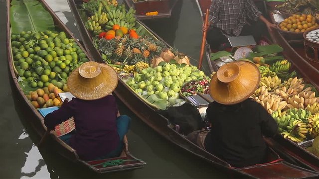 Fruits and vegetables were sold on boat the Damnoen saduak floating market is famous in Thailand