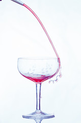 Drink being poured into glass 