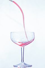 Drink being poured into glass 